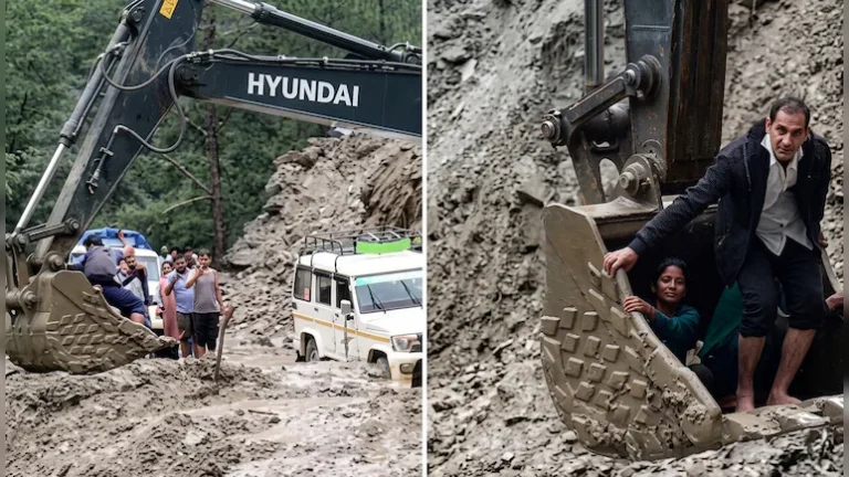 712qkuvc_video-villagers-risk-lives-use-excavator-bucket-to-cross-landslidehit-road-in-uttarakhand_625x300_08_August_26